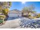 Two-story house with three car garage at 5912 Sea Hunter St, North Las Vegas, NV 89031