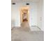 Clean hallway with carpet flooring and access to bedrooms and other rooms at 2251 Wigwam Pkwy # 1313, Henderson, NV 89074