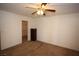 Bedroom with plush carpeting and ceiling fan, offering a comfortable and inviting atmosphere at 3134 Alfa Romero Ave, North Las Vegas, NV 89031