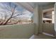 Exterior shot of a balcony with a view of a leafless tree at 905 Domnus Ln # 101, Las Vegas, NV 89144