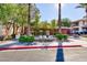 Exterior view of the community center with fountains and landscaped grounds at 905 Domnus Ln # 101, Las Vegas, NV 89144