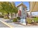 Inviting condo exterior featuring desert landscaping and neutral color scheme at 905 Domnus Ln # 101, Las Vegas, NV 89144