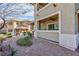 Building exterior featuring patios, desert landscaping and neutral paint at 905 Domnus Ln # 101, Las Vegas, NV 89144