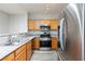 Modern kitchen featuring stainless steel appliances and ample counter space at 905 Domnus Ln # 101, Las Vegas, NV 89144