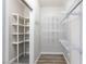 This walk-in closet has lots of shelving for maximum storage at 905 Domnus Ln # 101, Las Vegas, NV 89144