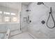 Modern bathroom with a marble shower and dual shower heads for a spa-like experience at 605 Canyon Greens Dr, Las Vegas, NV 89144