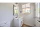 Bathroom featuring a modern vanity, sleek fixtures, and natural light at 605 Canyon Greens Dr, Las Vegas, NV 89144