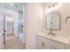 Bright bathroom featuring modern fixtures, a sleek vanity, and a combined shower and tub at 605 Canyon Greens Dr, Las Vegas, NV 89144