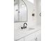 Bathroom featuring a white vanity, black faucet, and a modern mirror at 605 Canyon Greens Dr, Las Vegas, NV 89144