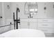 Bathroom vanity area with dual sinks, modern fixtures, and stylish lighting at 605 Canyon Greens Dr, Las Vegas, NV 89144