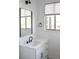 Bright bathroom featuring modern fixtures and a white vanity at 605 Canyon Greens Dr, Las Vegas, NV 89144