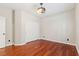 Cozy bedroom with hardwood floors, closet, and a ceiling light fixture at 9143 Irish Elk Ave, Las Vegas, NV 89149