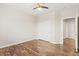 Bedroom with wood laminate floors and a closet at 9143 Irish Elk Ave, Las Vegas, NV 89149