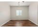 Bedroom with wood laminate flooring and a window for natural light at 9143 Irish Elk Ave, Las Vegas, NV 89149