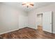 Bedroom with wood laminate flooring, a ceiling fan, and a closet at 9143 Irish Elk Ave, Las Vegas, NV 89149