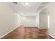 Bright bonus room with hardwood floors, white trim, and recessed lighting, perfect for entertaining at 9143 Irish Elk Ave, Las Vegas, NV 89149