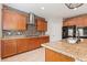 Well-equipped kitchen features granite countertops, stainless steel appliances, and ample cabinet space at 9143 Irish Elk Ave, Las Vegas, NV 89149