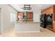 Modern kitchen with large island, granite countertops, stylish backsplash, and stainless steel appliances at 9143 Irish Elk Ave, Las Vegas, NV 89149