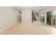 Open-concept living room with tile flooring, providing ample space and seamless transition between areas at 9143 Irish Elk Ave, Las Vegas, NV 89149