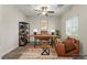 Cozy office features a wooden desk, comfortable seating, and modern decor for a productive workspace at 9143 Irish Elk Ave, Las Vegas, NV 89149