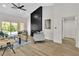 Living room features a modern fireplace and hardwood floors at 8812 Stoney Point Dr, Las Vegas, NV 89134