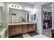 Double vanity bathroom with a large closet and plenty of storage at 12113 Rojo Roma Ave, Las Vegas, NV 89138