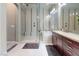Bathroom with walk-in shower, soaking tub, and double vanity at 12113 Rojo Roma Ave, Las Vegas, NV 89138