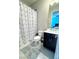 Clean bathroom with shower/tub combo, vanity, and tile floor at 12113 Rojo Roma Ave, Las Vegas, NV 89138
