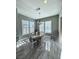 Bright dining room featuring a wood table and chandelier at 12113 Rojo Roma Ave, Las Vegas, NV 89138