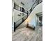 Elegant entryway with modern staircase and tiled floors at 12113 Rojo Roma Ave, Las Vegas, NV 89138