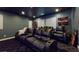 Home theater with reclining seats and large screen at 12113 Rojo Roma Ave, Las Vegas, NV 89138