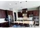 Modern kitchen features stainless steel appliances and a large kitchen island at 12113 Rojo Roma Ave, Las Vegas, NV 89138