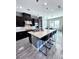 Modern kitchen with large island, stainless steel appliances, and ample cabinetry at 12113 Rojo Roma Ave, Las Vegas, NV 89138