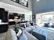 Open floor plan living room with kitchen and patio access at 12113 Rojo Roma Ave, Las Vegas, NV 89138