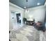 Cozy sitting area with comfortable seating and built-in shelving at 12113 Rojo Roma Ave, Las Vegas, NV 89138