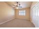 Spacious bedroom with ceiling fan and window shutters at 315 Foster Springs Rd, Las Vegas, NV 89148