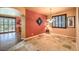 Bright dining room with tile floors and access to kitchen and living room at 315 Foster Springs Rd, Las Vegas, NV 89148