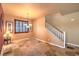 Dining room with tile floors, chandelier, and adjacent kitchen at 315 Foster Springs Rd, Las Vegas, NV 89148