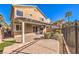 Home's backyard features a covered patio and a pergola at 315 Foster Springs Rd, Las Vegas, NV 89148