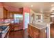 Kitchen boasts stainless steel appliances and an island with granite countertops at 315 Foster Springs Rd, Las Vegas, NV 89148