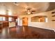 Spacious living room with hardwood floors and a view into the kitchen at 315 Foster Springs Rd, Las Vegas, NV 89148
