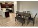 Dining area featuring table with seating adjacent to kitchen with stainless steel appliances at 3245 Montage Dr, Henderson, NV 89044