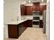 Modern kitchen featuring granite countertops, stainless steel appliances, and ample cabinet space at 3245 Montage Dr, Henderson, NV 89044