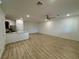 Bright living area boasts an open layout, hardwood floors, modern ceiling fan, and recessed lighting at 3245 Montage Dr, Henderson, NV 89044