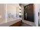 Sleek bathroom with a walk-in shower, marble countertops, and modern fixtures at 4 Olympia Summit Dr, Las Vegas, NV 89141
