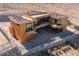 View of a modern home under construction featuring flat and tile roofs with large picture windows at 4 Olympia Summit Dr, Las Vegas, NV 89141