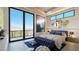 Well-lit main bedroom with a plush blue bench, decorative mirrors, and scenic views at 4 Olympia Summit Dr, Las Vegas, NV 89141