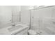 Bathroom featuring a glass-enclosed shower and a single sink vanity offering a clean and modern design at 651 N Water St, Henderson, NV 89015