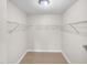 Spacious walk-in closet with wire shelving at 2130 Sealion Dr # 207, Las Vegas, NV 89128