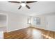 Living room with hardwood floors and access to other rooms at 2130 Sealion Dr # 207, Las Vegas, NV 89128